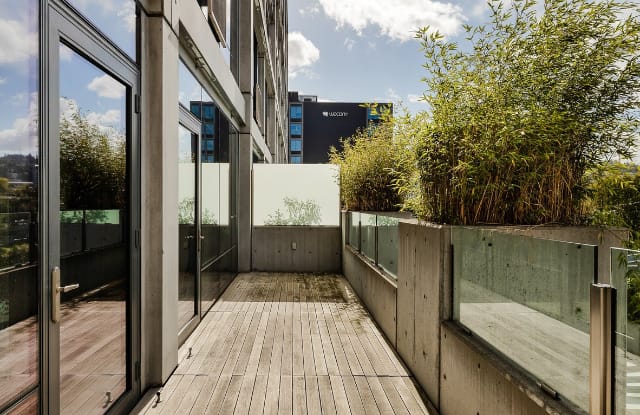Private terrace with wooden decking and city views